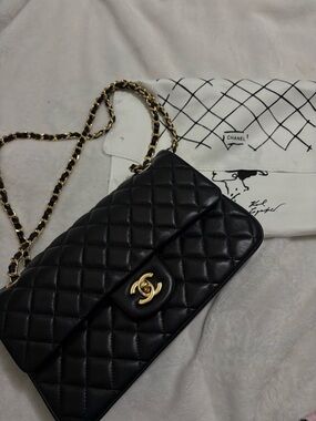 CHANEL Black Quilted Leather Crossbody with Gold Chain